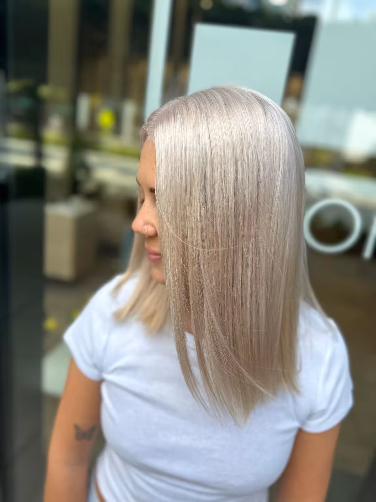Icy platinum blonde shoulder-length hair with sleek straight finish - platinum blonde color Honolulu